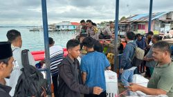 Gunakan Transportasi Laut, Kapolsek Belakang Padang Arungi Lautan Mengawal Kotak Suara Pilkada Menuju Kantor PPK